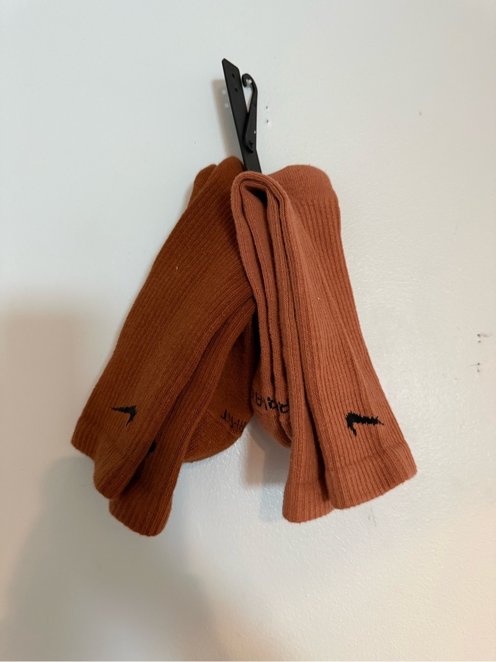 Nike Crew Socks in Rust/Burnt Orange with Black Swoosh